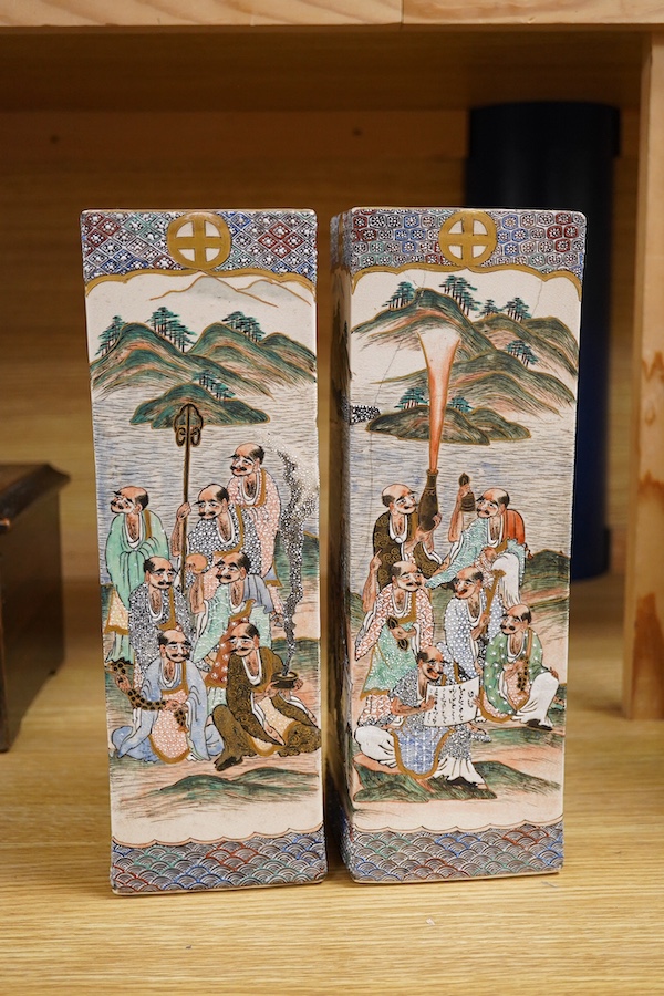 A pair of Satsuma square section vases, Meiji period, 31cm high, 10cm wide. Condition - one vase has deep cracking to one surface